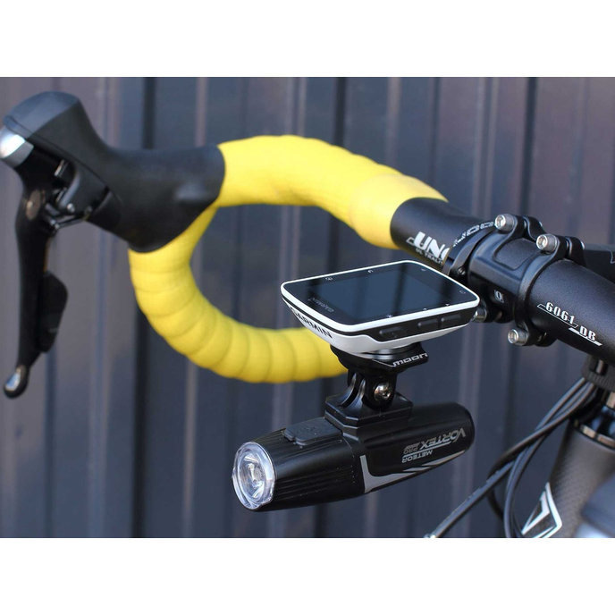 Raztegljivo držalo za kolesarski računalnik in luč